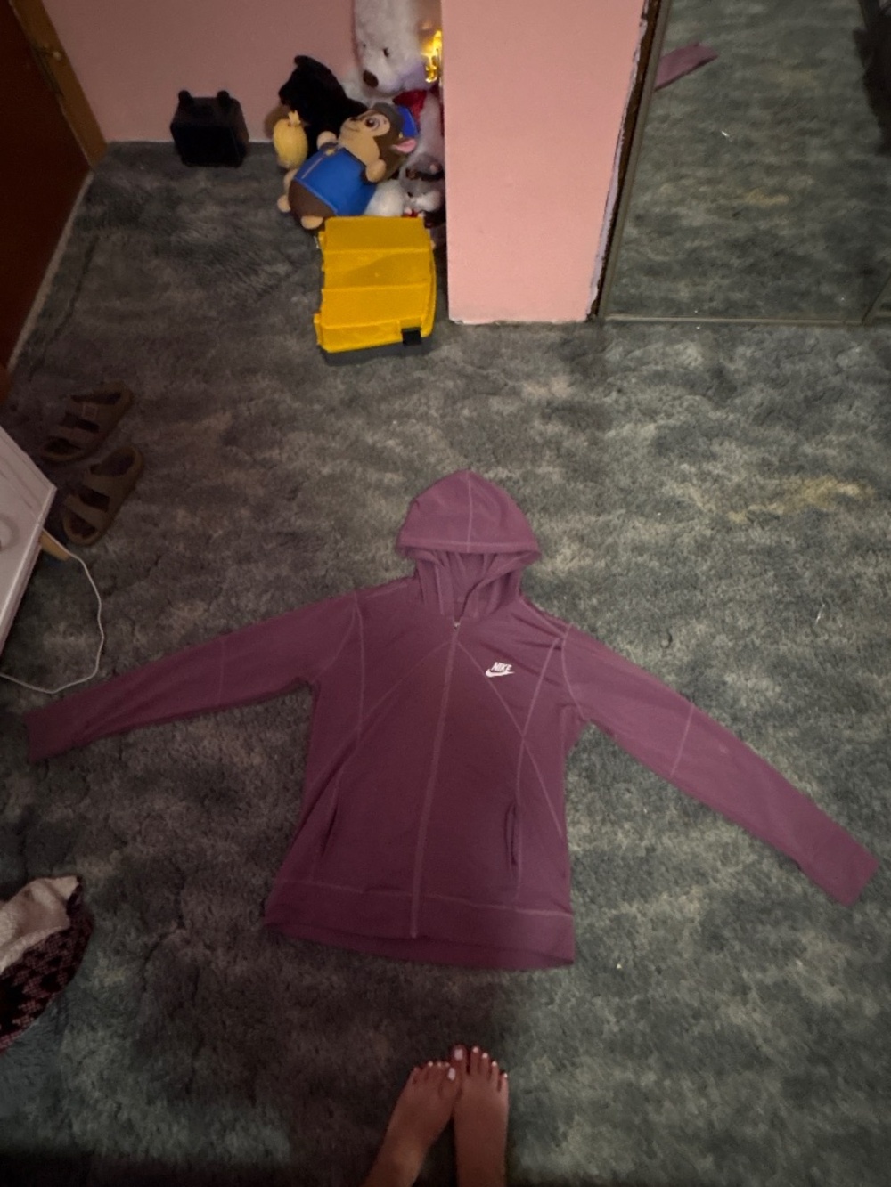 A women’s dark purple nike zip up sweatshirt!